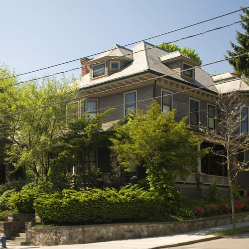 building exterior with trees surrounding